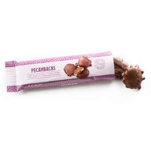 Pecanbacks featuring plump pecans coated with fresh caramel and drenched in creamy milk chocolate.