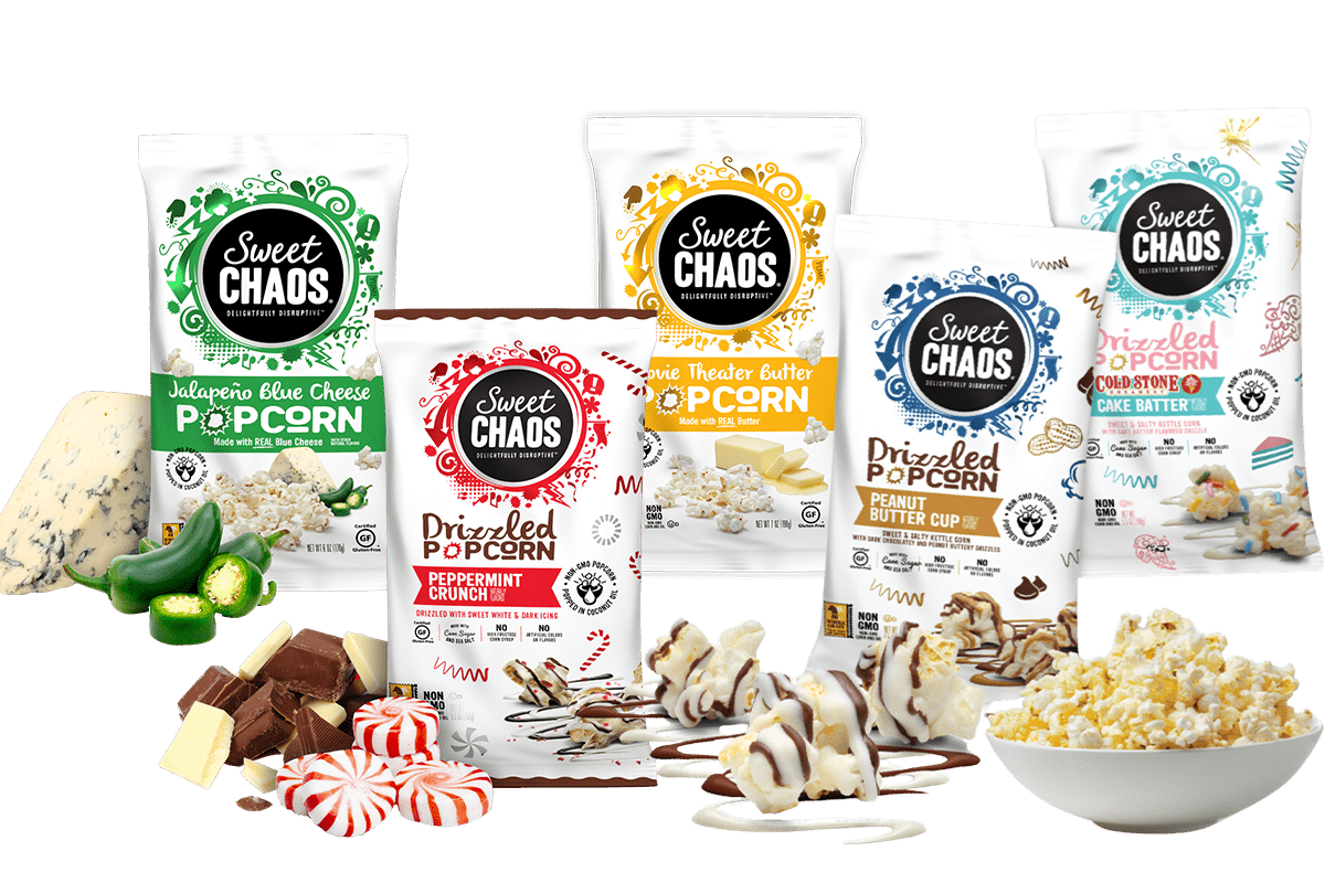 An assortment of Sweet Chaos popcorn flavors, including Jalapeño Blue Cheese, Movie Theater Butter, Peanut Butter Cup, Peppermint Crunch, and Cold Stone Cake Batter, displayed with complementary ingredients like chocolate, peppermint, cheese, and popcorn.