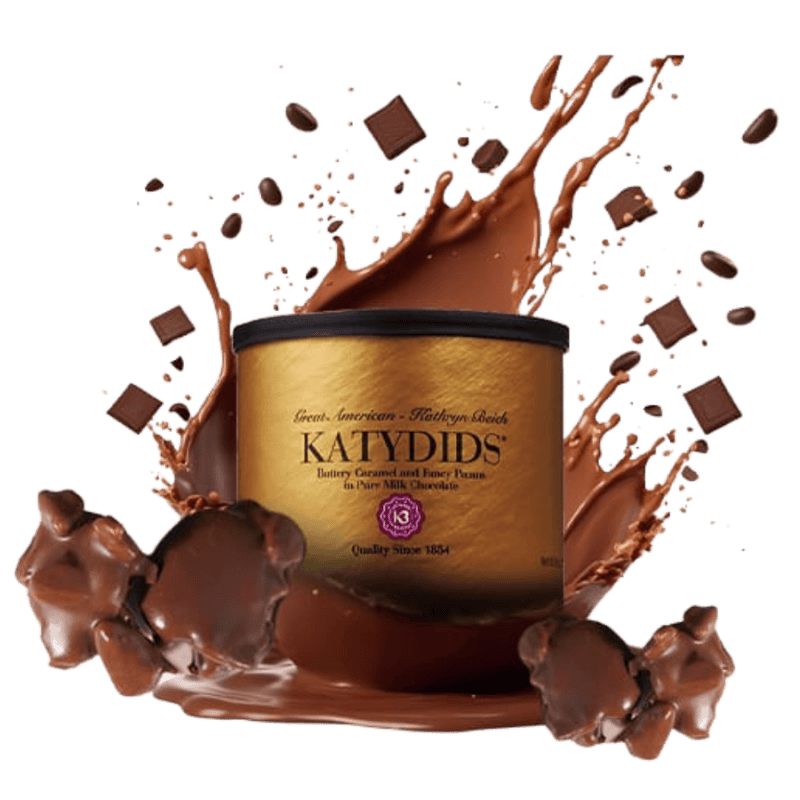 Katydids tin surrounded by chocolate pieces, pecans, and a splash of milk chocolate.